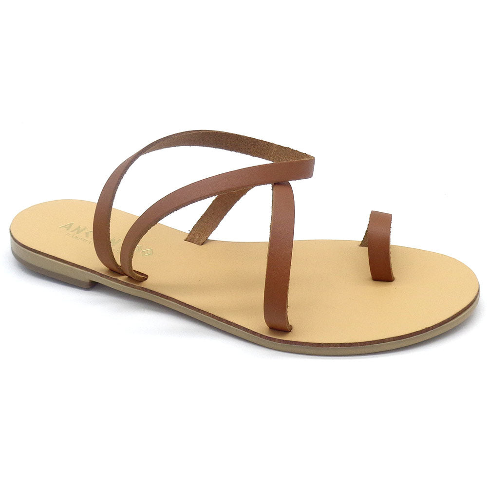 Brown sandal with a beige sole on a white background