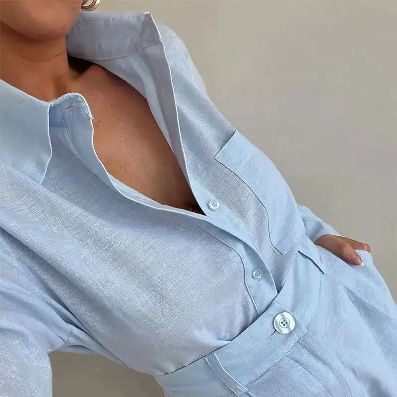 Light blue shirt worn by a person with a neutral background