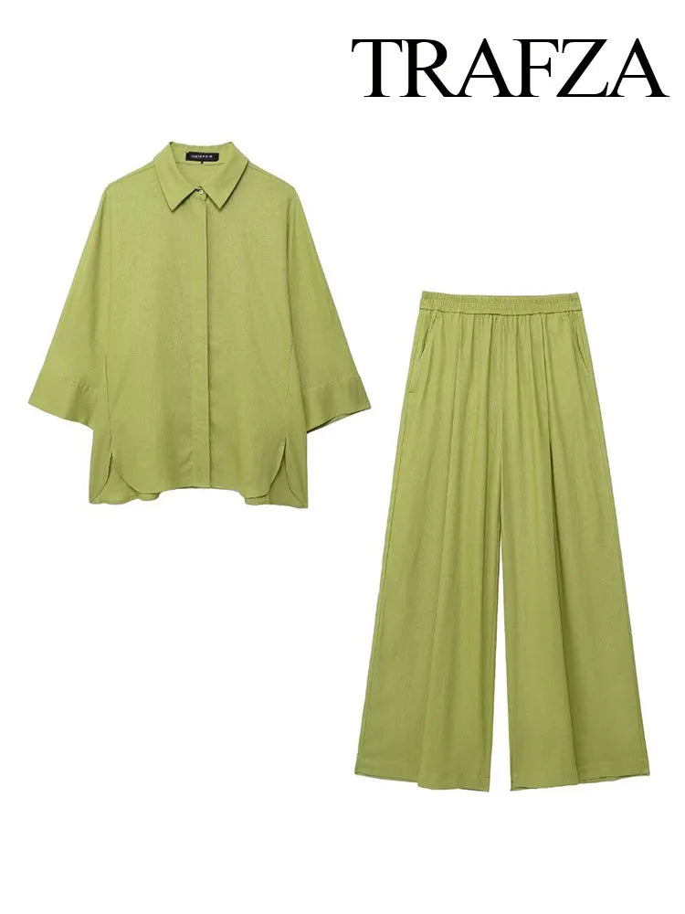 Green shirt and wide-leg pants set with Trafza branding on a white background