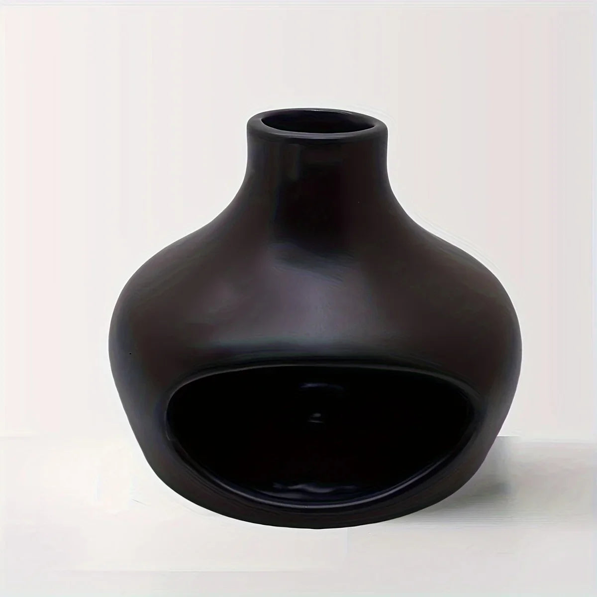Black vase on a white background