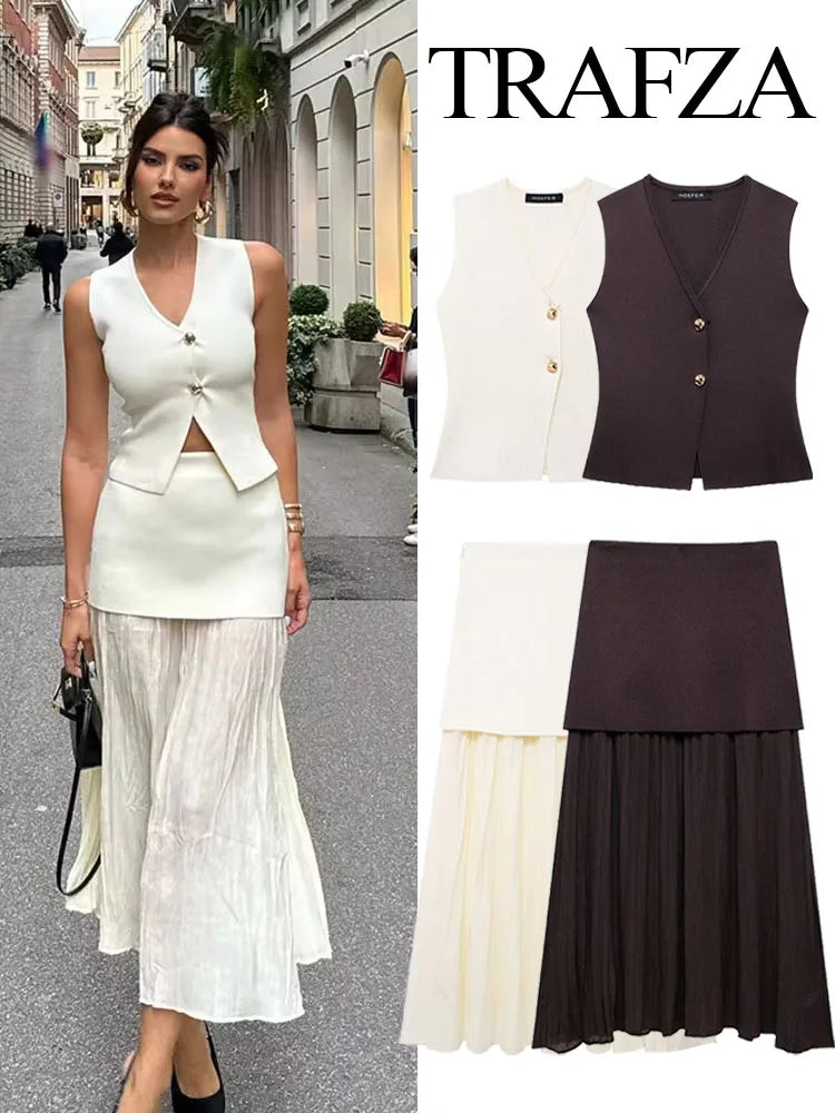 Woman wearing a white top and black skirt with 'Trafza' branding.