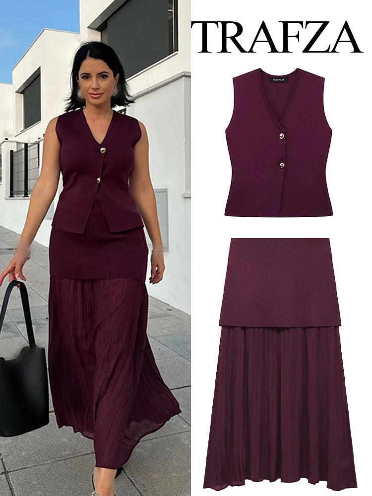 Woman wearing a purple outfit with a matching vest and skirt, standing outdoors. Trafza brand is displayed.