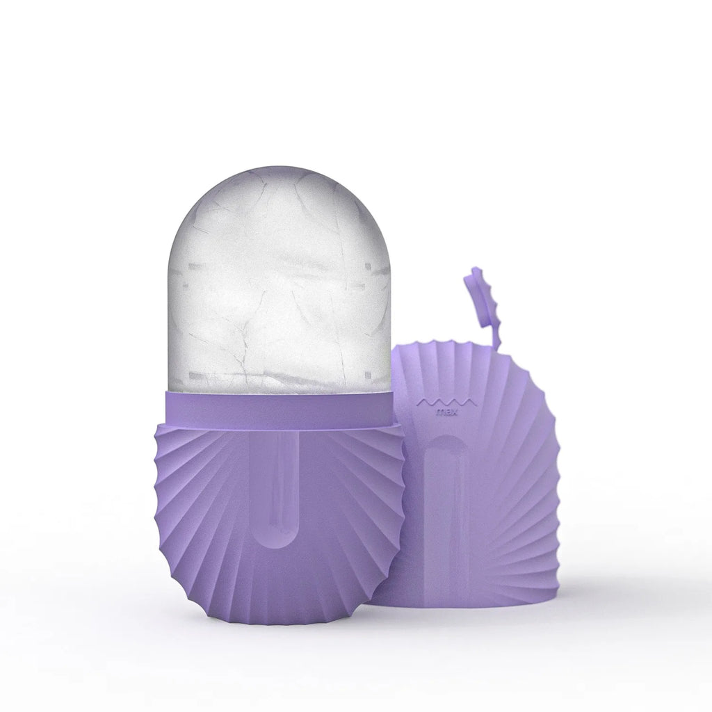Purple silicone shell-shaped container with a clear dome lid on a white background