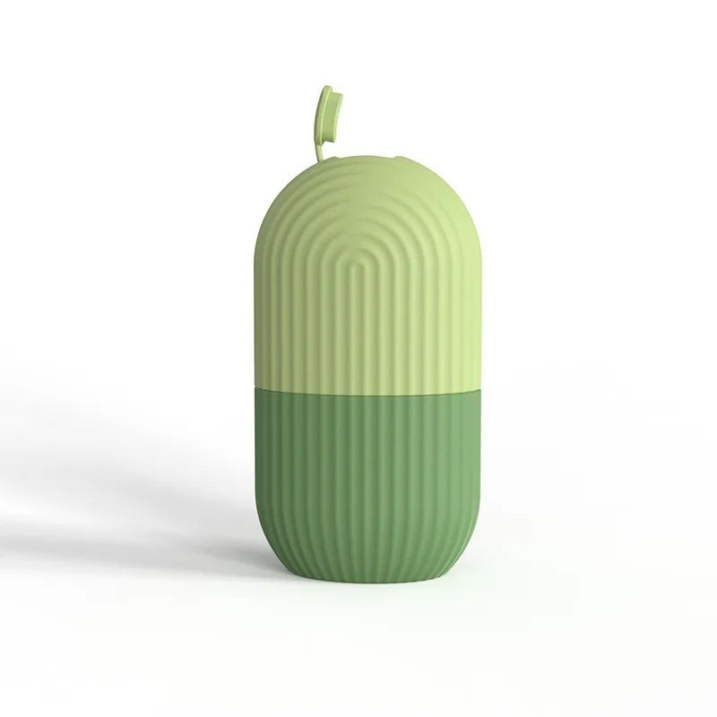 Green textured container with a ribbed surface on a white background