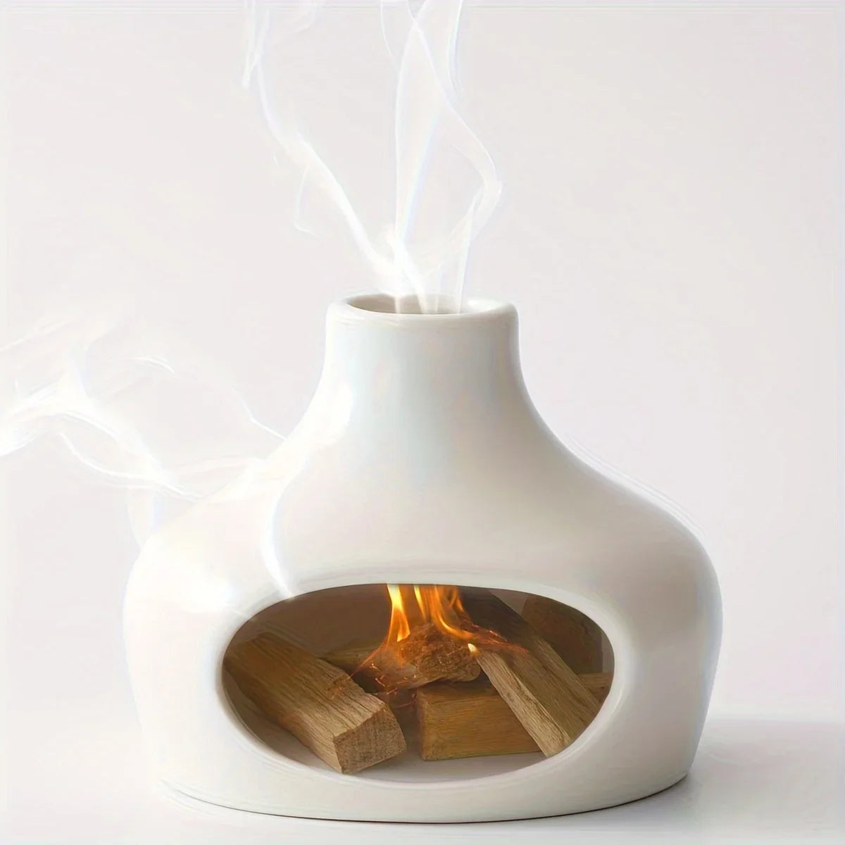 White ceramic fireplace with wood logs and smoke on a white background
