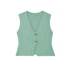 Green vest with buttons on a white background