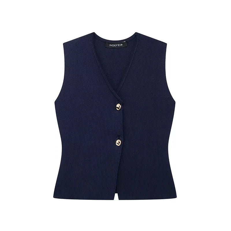 Navy blue vest with gold buttons on a white background