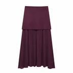 Maroon layered skirt on a white background