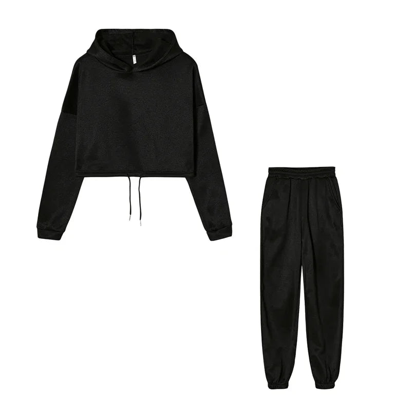 Black hoodie and black pants set on a white background