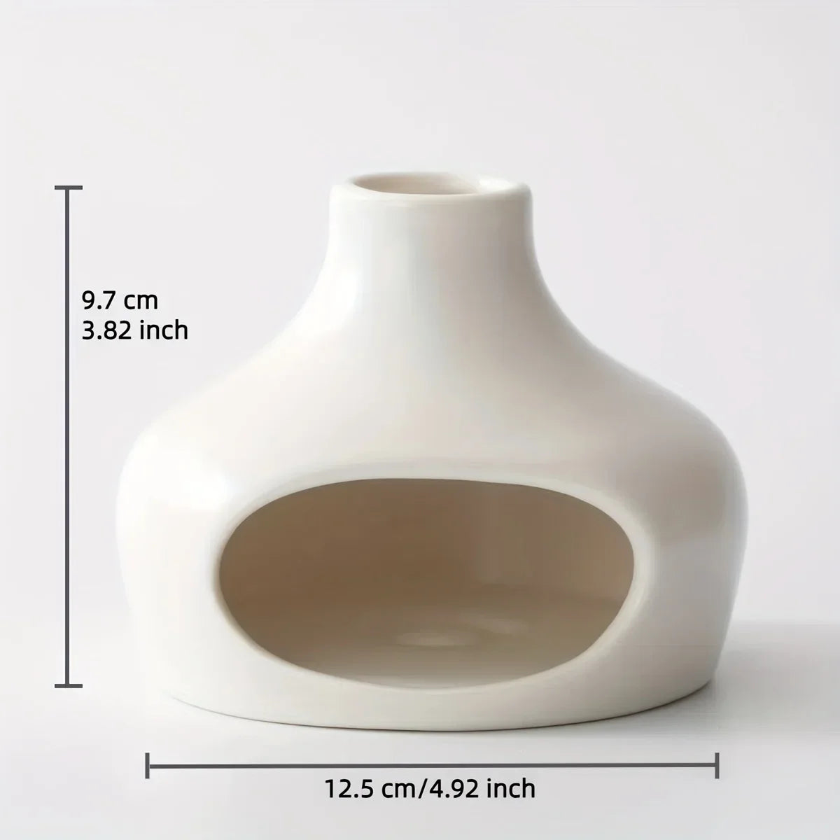 White ceramic vase with dimensions indicated on a light gray background