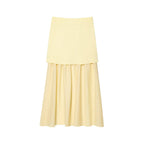 Yellow layered skirt on a white background